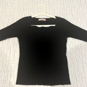 Black soft sweater made in Korea. Cute neck and cuff design.